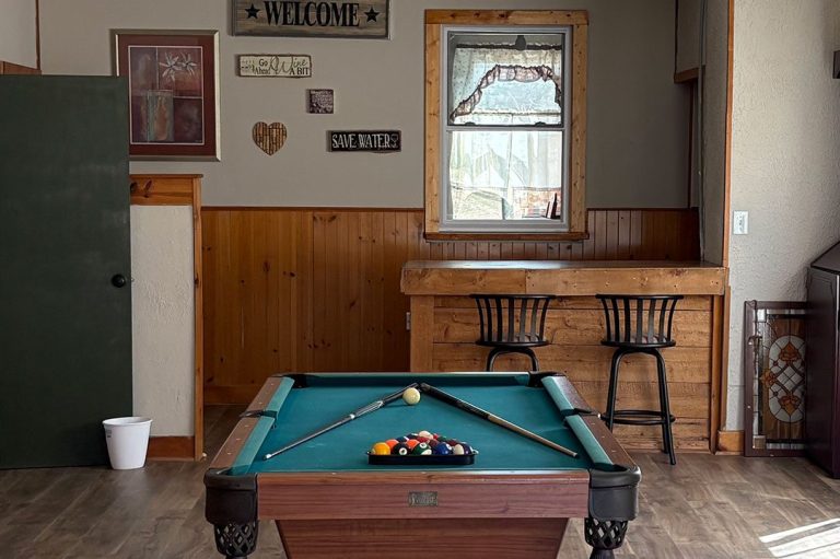 Pool Table in the Game Room and Bar Area Image