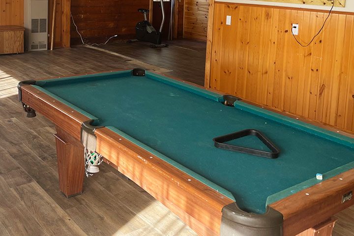 Pool Table in the Game Room and Bar Area Image
