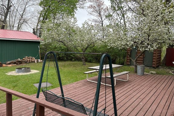 Back Deck with Picnic Table and Firepit Image