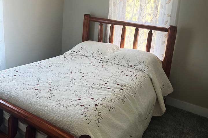 Bedroom with One Full-size Bed Image